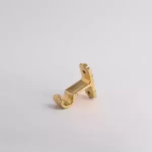 Soporte cortinero muro dorado